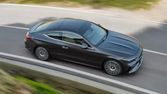 2024-mercedes-benz-cle-coupe-black-front-right-driving-overhead