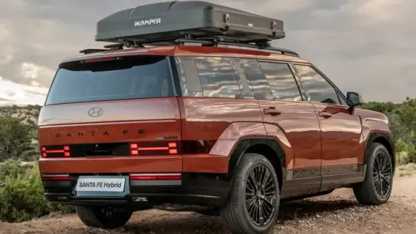 2024-hyundai-santa-fe-hybrid-rear-quarter-orange-1